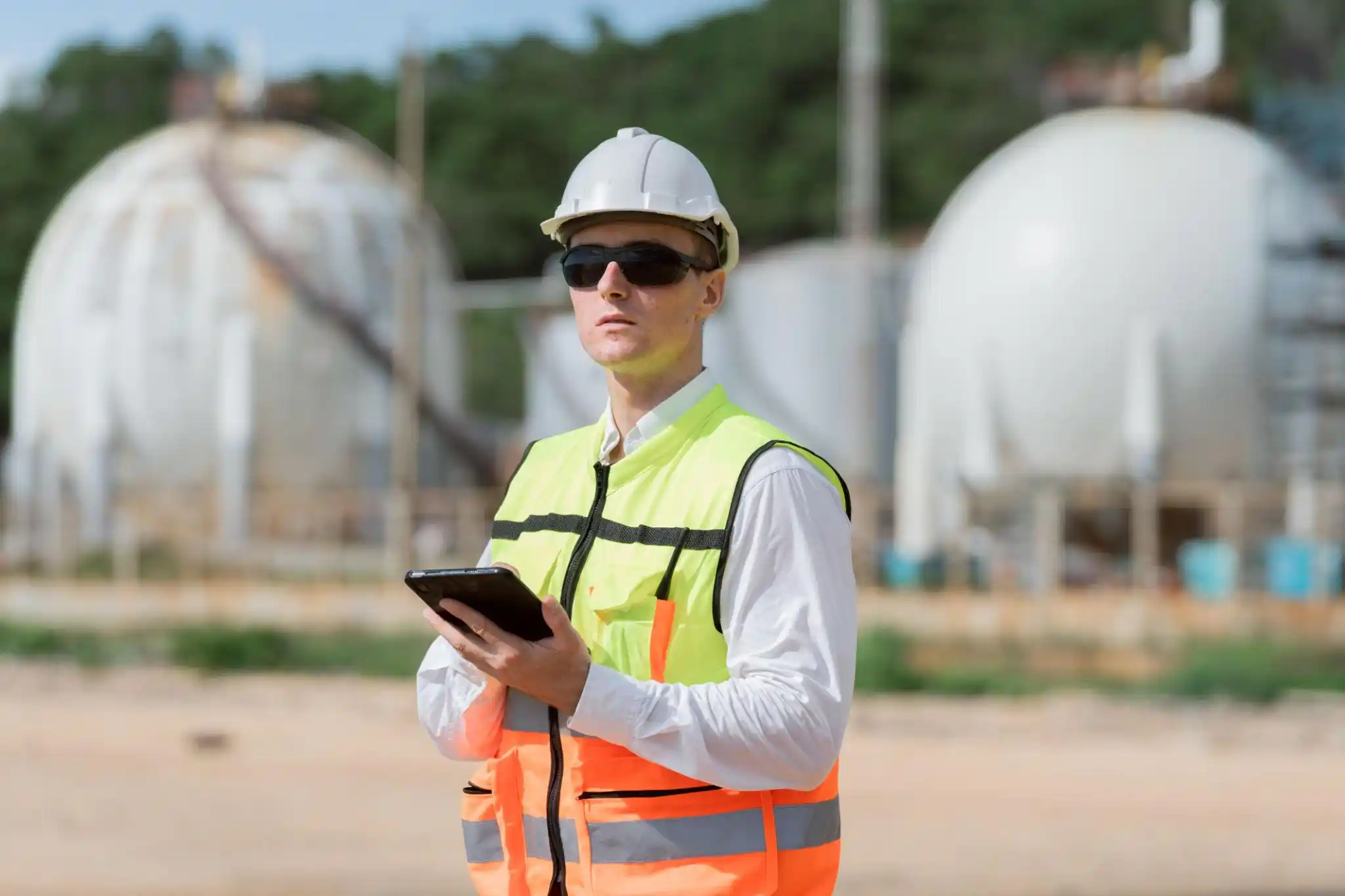 Occupational health and safety professional at an industrial workplace
